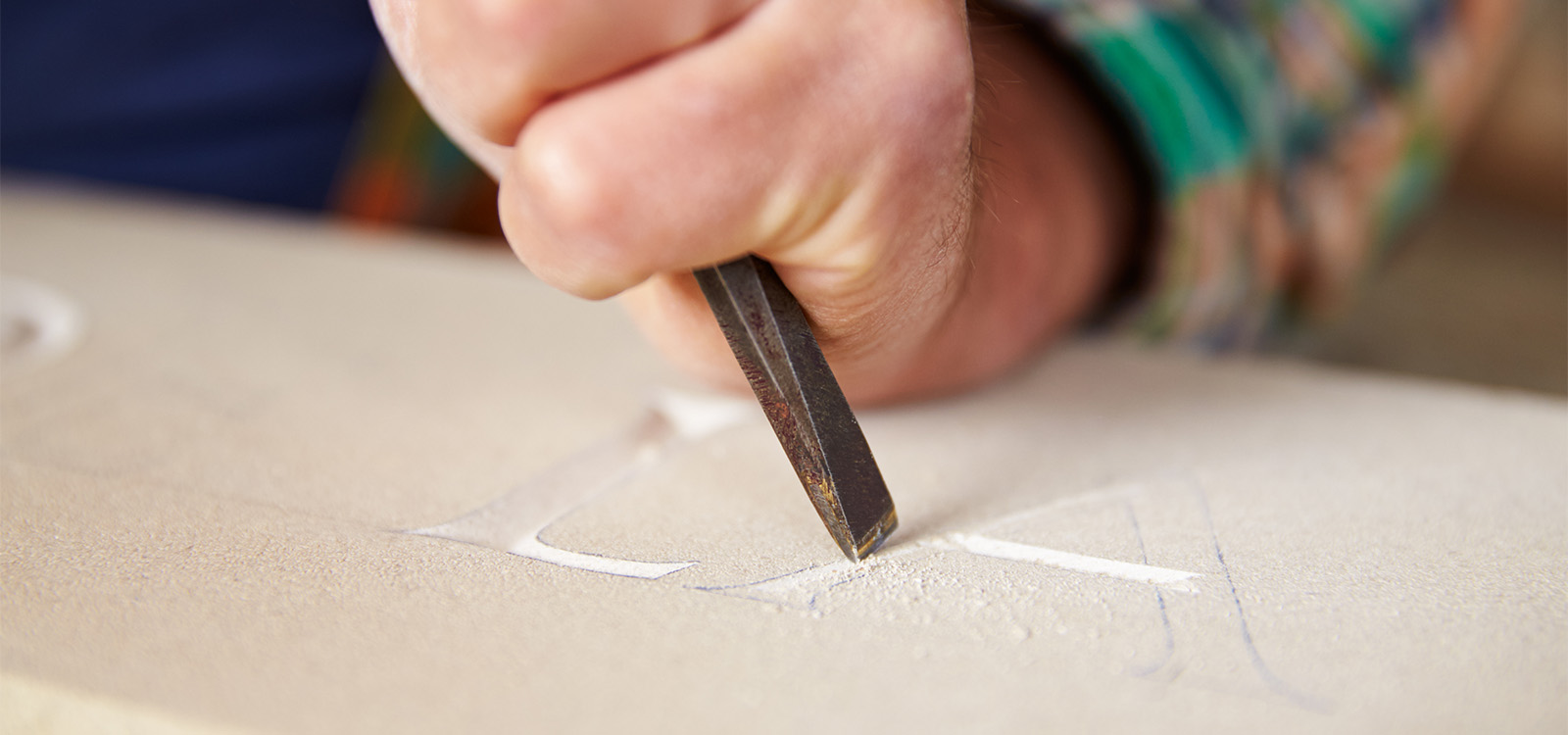 Hand tools being used on traditional stonework
